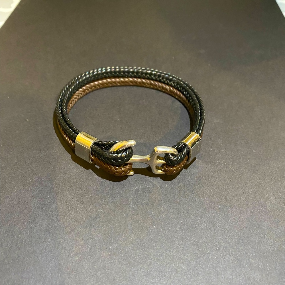 Black and brown bracelet with silver anchor